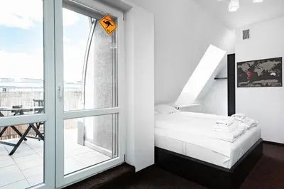 Łóżko lub łóżka w pokoju w obiekcie Apartments Wrocław Manganowa by Noclegi Renters