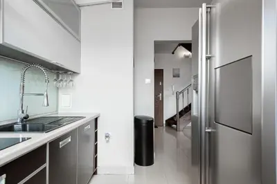 Kuchnia lub aneks kuchenny w obiekcie Apartments Wrocław Manganowa by Noclegi Renters