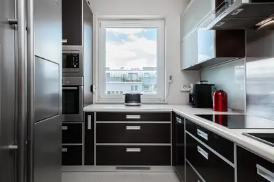 Kuchnia lub aneks kuchenny w obiekcie Apartments Wrocław Manganowa by Noclegi Renters