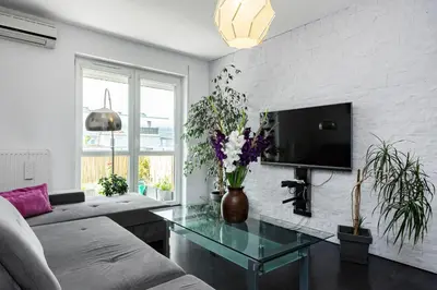 Telewizja i/lub zestaw kina domowego w obiekcie Apartments Wrocław Manganowa by Noclegi Renters