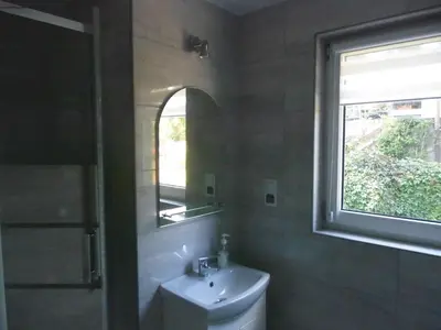 Łazienka w obiekcie Bezowy pokój