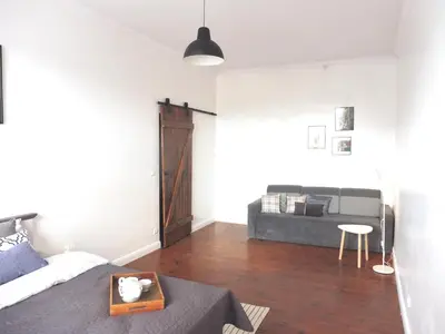 Łóżko lub łóżka w pokoju w obiekcie Apartament Pod Tężnią