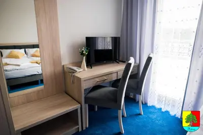 Łóżko lub łóżka w pokoju w obiekcie POD DĘBEM