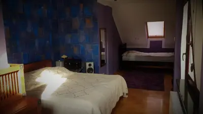 Łóżko lub łóżka w pokoju w obiekcie Luxury House
