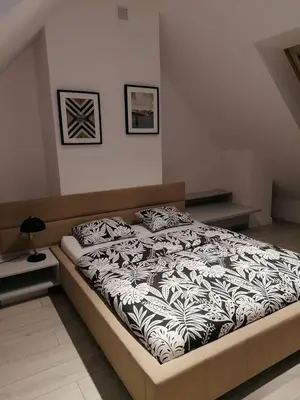 Łóżko lub łóżka w pokoju w obiekcie AbsyntApartments Old Town Wroclaw