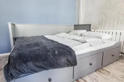 Łóżko lub łóżka w pokoju w obiekcie Smart Rental Management Kotlarska Apartment