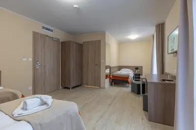 Łóżko lub łóżka w pokoju w obiekcie Przystanek Alaska