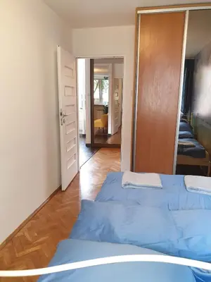 Łóżko lub łóżka w pokoju w obiekcie Lemon Tree Apartment