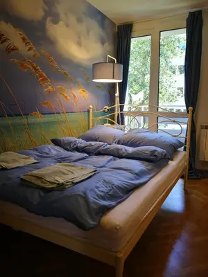 Łóżko lub łóżka w pokoju w obiekcie Lemon Tree Apartment