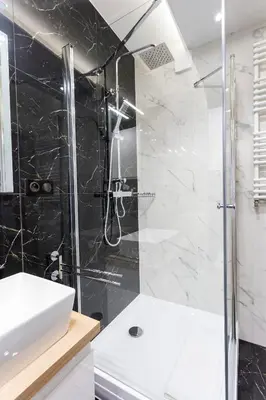 Łazienka w obiekcie Tymon Apartament przy deptaku