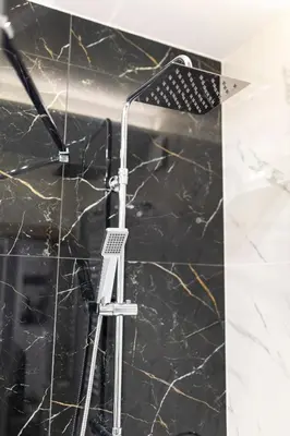 Łazienka w obiekcie Tymon Apartament przy deptaku