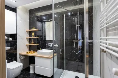 Łazienka w obiekcie Tymon Apartament przy deptaku
