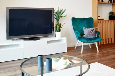 Telewizja i/lub zestaw kina domowego w obiekcie Don Kichot Apartment
