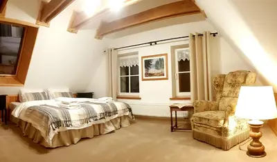 Łóżko lub łóżka w pokoju w obiekcie Dom Jesionów