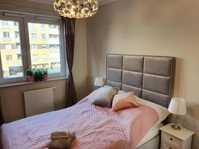 Łóżko lub łóżka w pokoju w obiekcie Apartament Old Town Teczowa