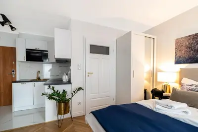Łóżko lub łóżka w pokoju w obiekcie Apartament Oławska