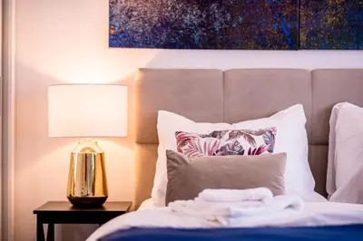 Łóżko lub łóżka w pokoju w obiekcie Apartament Oławska