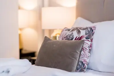 Łóżko lub łóżka w pokoju w obiekcie Apartament Oławska