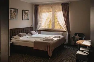Łóżko lub łóżka w pokoju w obiekcie Villa Paula