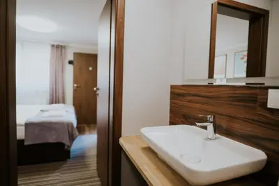 Łóżko lub łóżka w pokoju w obiekcie Villa Paula