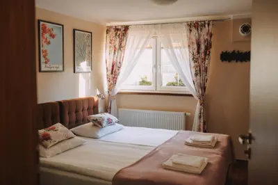 Łóżko lub łóżka w pokoju w obiekcie Villa Paula