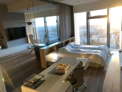Łóżko lub łóżka w pokoju w obiekcie Vantage Point Apartament Sky Tower