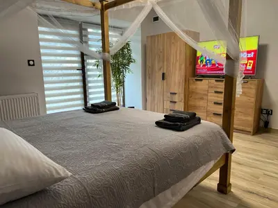 Łóżko lub łóżka w pokoju w obiekcie APARTAMENT Kudowa Zdrój - Słone