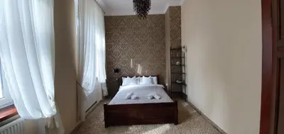 Łóżko lub łóżka w pokoju w obiekcie APARTAMENT ADA