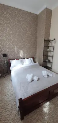 Łóżko lub łóżka w pokoju w obiekcie APARTAMENT ADA