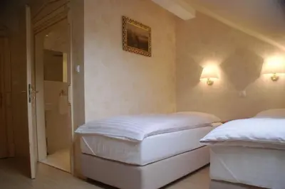 Łóżko lub łóżka w pokoju w obiekcie Villa la Val, Karkonosze