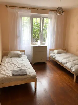 Łóżko lub łóżka w pokoju w obiekcie Apartament przy zoo