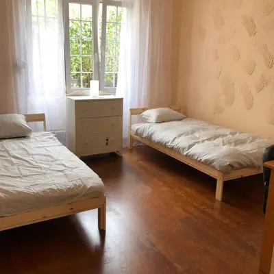 Łóżko lub łóżka w pokoju w obiekcie Apartament przy zoo