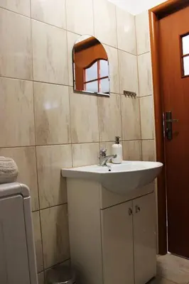 Łazienka w obiekcie Mieszkanie na uboczu Dobrzeń Wielki