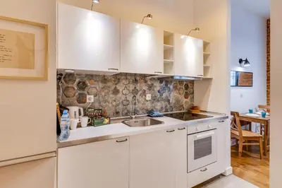Kuchnia lub aneks kuchenny w obiekcie Apartament Uroczy Zakątek