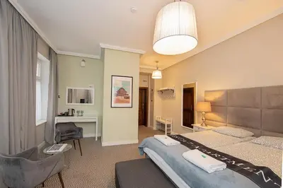 Łóżko lub łóżka w pokoju w obiekcie CIENISTA 7 APARTMENTS