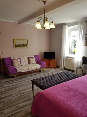 Łóżko lub łóżka w pokoju w obiekcie Agroturystyka u Kasi