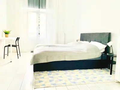 Łóżko lub łóżka w pokoju w obiekcie Legnica Apartament 82m2 Delux 5