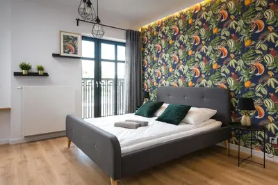 Łóżko lub łóżka w pokoju w obiekcie King4You Apartments