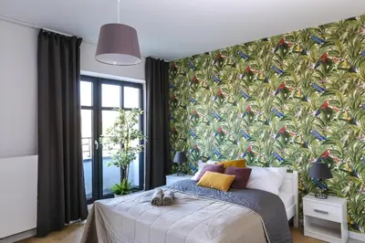 Łóżko lub łóżka w pokoju w obiekcie King4You Apartments
