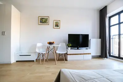 Telewizja i/lub zestaw kina domowego w obiekcie King4You Apartments