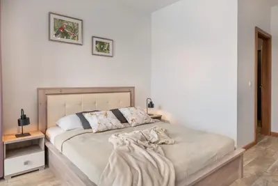 Łóżko lub łóżka w pokoju w obiekcie King4You Apartments