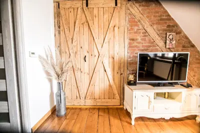 Telewizja i/lub zestaw kina domowego w obiekcie AP Apartment's Widok na Góry