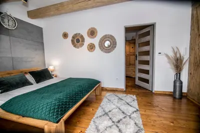 Łóżko lub łóżka w pokoju w obiekcie AP Apartment's Widok na Góry