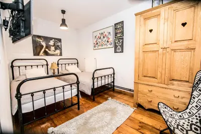 Łóżko lub łóżka w pokoju w obiekcie AP Apartment's Widok na Góry