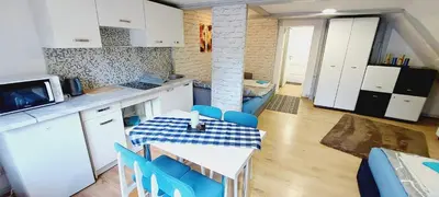 Kuchnia lub aneks kuchenny w obiekcie Słoneczny apartament