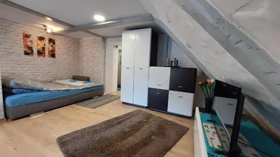 Łóżko lub łóżka w pokoju w obiekcie Słoneczny apartament