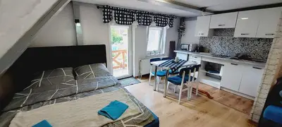 Kuchnia lub aneks kuchenny w obiekcie Słoneczny apartament