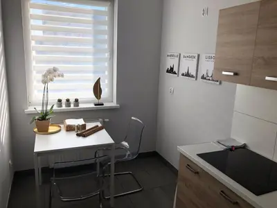 Kuchnia lub aneks kuchenny w obiekcie APARTAMENT ŚMIAŁEGO 9