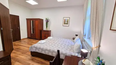 Łóżko lub łóżka w pokoju w obiekcie Petite Charlotta