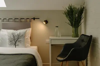 Łóżko lub łóżka w pokoju w obiekcie Villa Antiqua